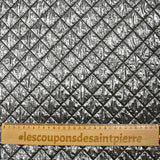 Silver quilted black background