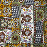 Viscose satin patchwork print with brown, apple green and ocher ornament