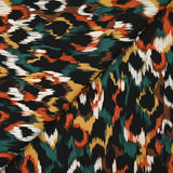 Viscose satin printed Venus burnt orange black background