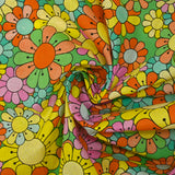 Cotton printed flower power pink green background