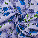 Cotton poplin printed climbing flowers with purple polka dot background