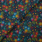 Cotton poplin printed with embroidered flowers on a midnight blue background
