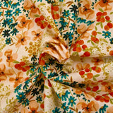 Cotton poplin printed with country meadow and ecru background