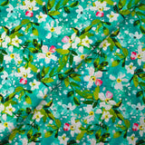 Jasmine printed cotton poplin with turquoise background