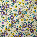 Cotton poplin printed with earthenware flowers on an ecru background