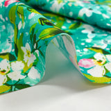 Jasmine printed cotton poplin with turquoise background