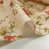 Cotton poplin printed with flowers and its shadows on an ecru background