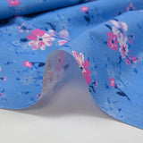 Cotton poplin printed bouquet in the clouds cornflower blue background