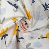 Cotton poplin printed with flower design on white background