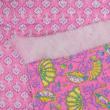 Double-sided quilted cotton Inaya pink by the meter