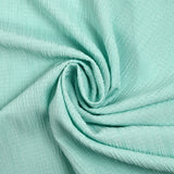 Crépon de polyester effet seersucker vert d'eau