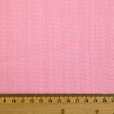 Crépon de polyester effet seersucker rose clair