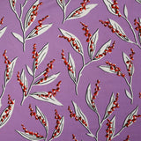 Satin viscose knit printed with a sprig of lily of the valley, mauve background
