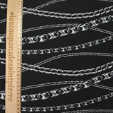 Satin viscose knit printed in black background chain