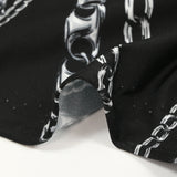 Satin viscose knit printed in black background chain