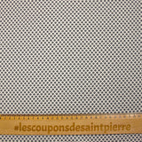 Cotton jersey with dotted diamond print on ecru background