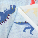 Cotton dinosaur print with sky background