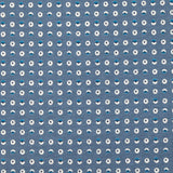Punto de algodón estampado círculos y medias lunas carro fondo azul