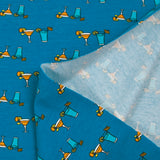 Cotton jersey cocktail print with turquoise background