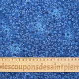 Cotton floral garden print with cobalt blue background