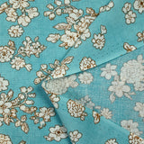 Off-white spring printed viscose with azurin blue background