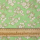 Off-white spring printed viscose with light green background