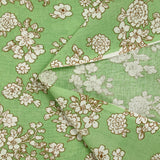 Off-white spring printed viscose with light green background