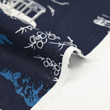 Algodón estampado japonés con fondo azul marino.