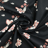 Cotton poplin printed aloha flower brown black background