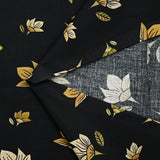 Cotton poplin printed pastel yellow flower and honey black background