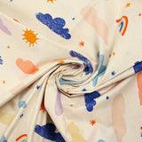 Cloud and sun printed cotton poplin on ecru background