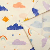 Cloud and sun printed cotton poplin on ecru background