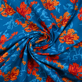 Cotton poplin printed stylized flower orange turquoise background