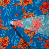 Cotton poplin printed stylized flower orange turquoise background