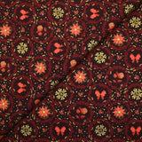 Popeline de coton imprimée poinsettias et nœuds orange fond marron