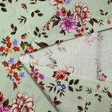 Cotton poplin printed with purple arabesque flower and green-gray background