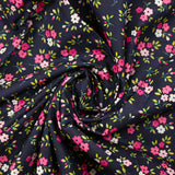 Cotton poplin printed mini pink flower on mineral blue background