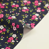 Cotton poplin printed mini pink flower on mineral blue background