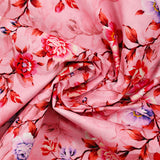 Cotton poplin printed with romantic coral pink background