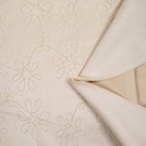Ecru embroidered scuba suede
