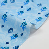 Cotton poplin printed flower symbol light blue arabesque background