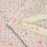 Wool blend tweed pink and blue confetti purple background