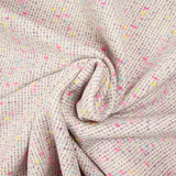 Wool blend tweed pink and blue confetti purple background