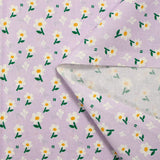 White daisy printed cotton poplin with purple background