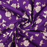 Brown ornamental printed cotton poplin with purple background