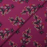 Cotton poplin printed with satellite flowers on a purple background