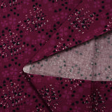 Cotton poplin printed with rustic romance on a purple background