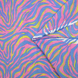Cotton yellow and blue zebra print with pink background