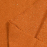Bord-côte lurex doré tubulaire orange brûlé vendu au mètre