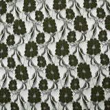 Martha metallic silver polyester lace with khaki background